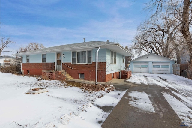 view of front of property with an outbuilding and a garage