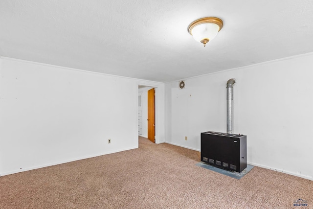 unfurnished living room featuring carpet flooring and a textured ceiling