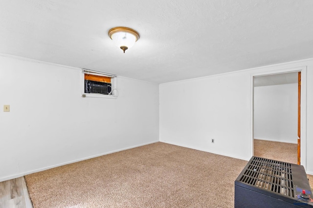 interior space with a textured ceiling and carpet floors