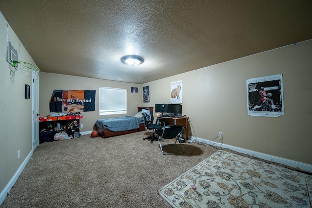 carpeted bedroom with a textured ceiling