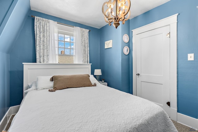 1016 W Blvd, Rapid City, SD 57701 - bedroom with baseboards and an inviting chandelier