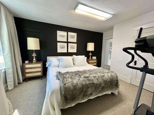 1016 W Blvd, Rapid City, SD 57701 - carpeted bedroom with a textured ceiling