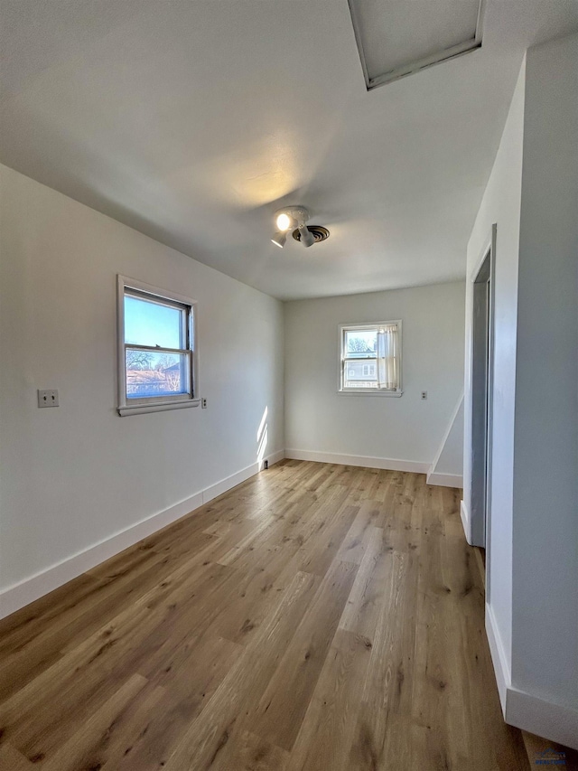 1016 W Blvd, Rapid City, SD 57701 - unfurnished room featuring light wood-style floors and baseboards