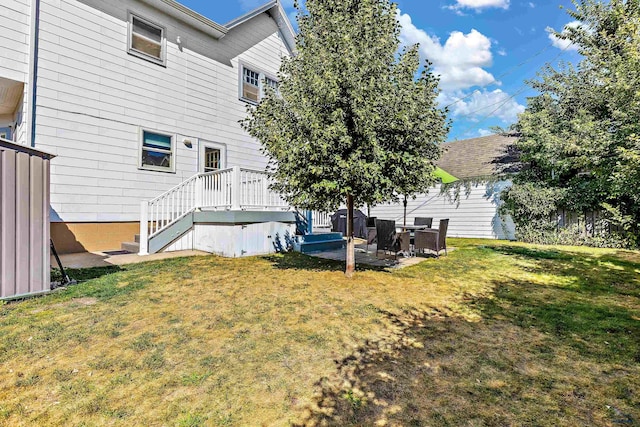1016 W Blvd, Rapid City, SD 57701 - rear view of house with a yard and a patio