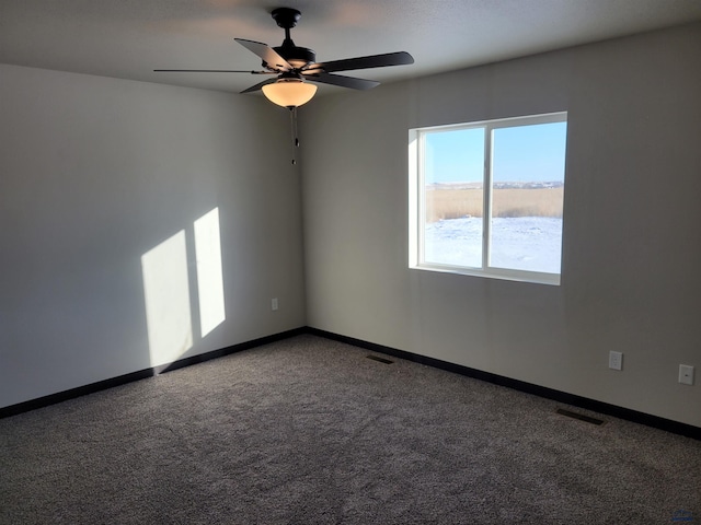 1154 Cobalt Dr, Rapid City, SD 57701 - carpeted empty room featuring ceiling fan and baseboards