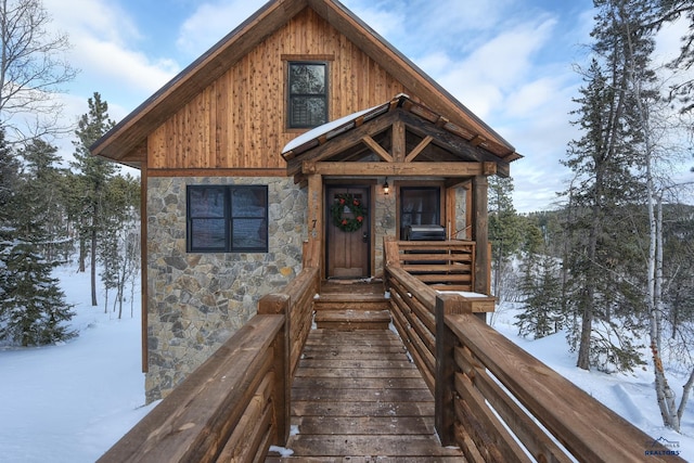 view of front of home with stone siding