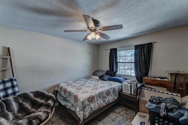 bedroom featuring ceiling fan and a textured ceiling