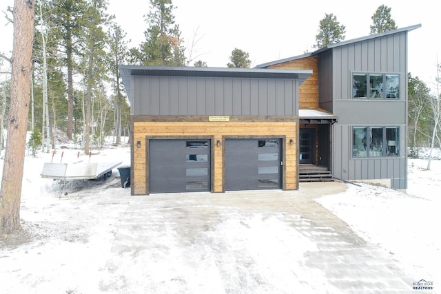 21268 Rubys Way, Lead, SD 57754 - view of front of property with a garage and board and batten siding