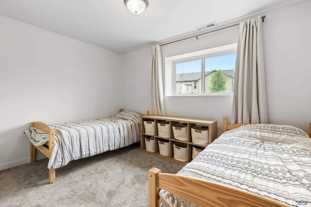 bedroom featuring carpet and visible vents