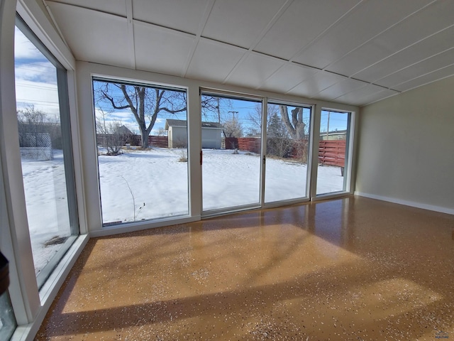 doorway to outside with speckled floor