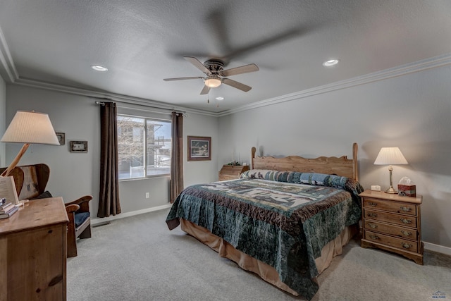 bedroom featuring crown molding, light colored carpet, ceiling fan, a textured ceiling, and baseboards