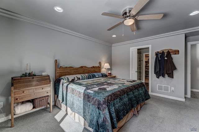 bedroom with recessed lighting, visible vents, baseboards, carpet, and crown molding