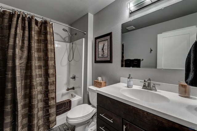 full bathroom with a textured wall, toilet, visible vents, vanity, and shower / bathtub combination with curtain