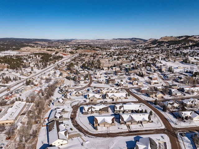 drone / aerial view featuring a mountain view and a residential view