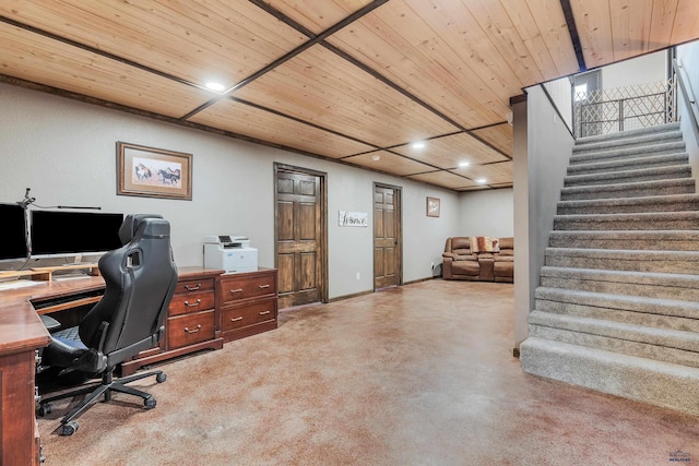 office space featuring baseboards, concrete floors, wooden ceiling, and recessed lighting