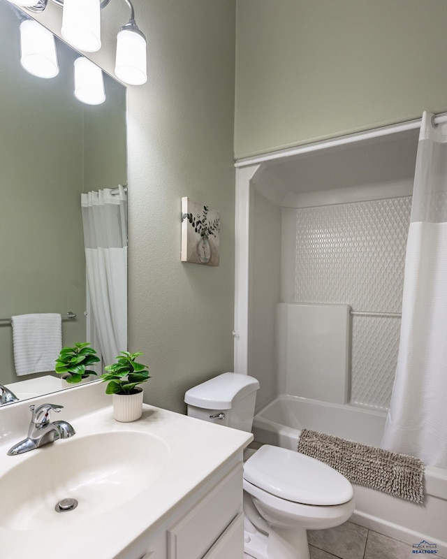 bathroom with vanity, tile patterned flooring, toilet, and shower / bathtub combination with curtain