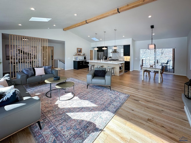 20216 Ponderosa Dr, Whitewood, SD 57793 - living area with light wood-style flooring, a skylight, baseboards, and recessed lighting