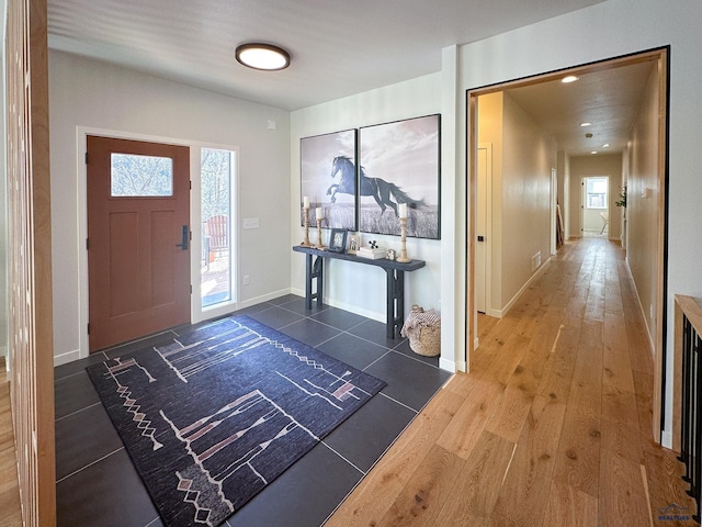 20216 Ponderosa Dr, Whitewood, SD 57793 - entryway with plenty of natural light, wood finished floors, baseboards, and recessed lighting