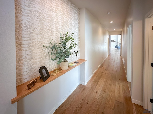 20216 Ponderosa Dr, Whitewood, SD 57793 - hall with light wood-style flooring, baseboards, and recessed lighting