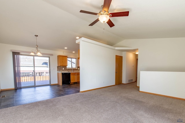 unfurnished living room featuring lofted ceiling, dark carpet, visible vents, and baseboards