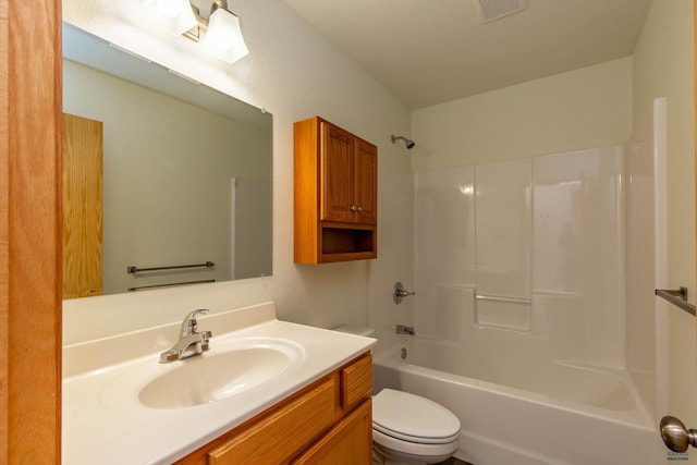 bathroom featuring toilet, visible vents, shower / bathing tub combination, and vanity