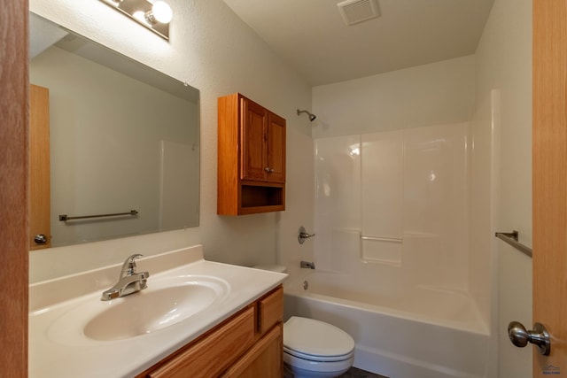 full bath featuring toilet, washtub / shower combination, visible vents, and vanity