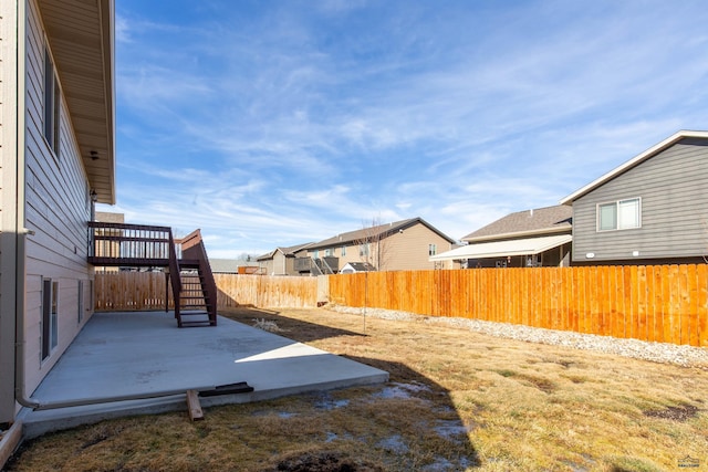 view of yard featuring a fenced backyard and a patio