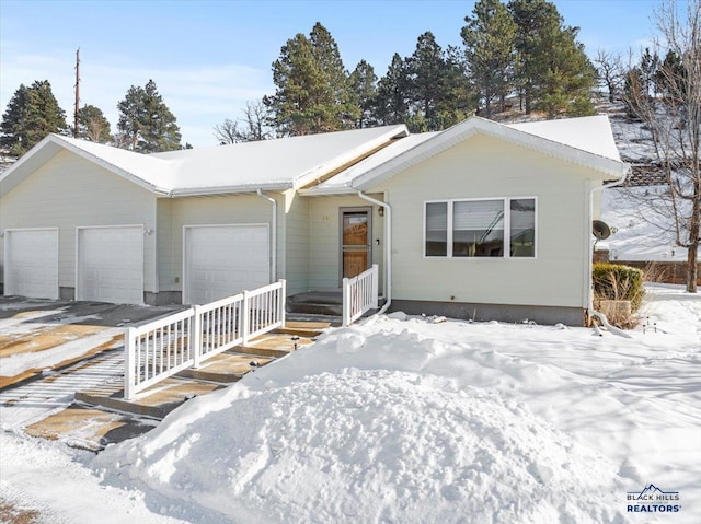 single story home with a garage