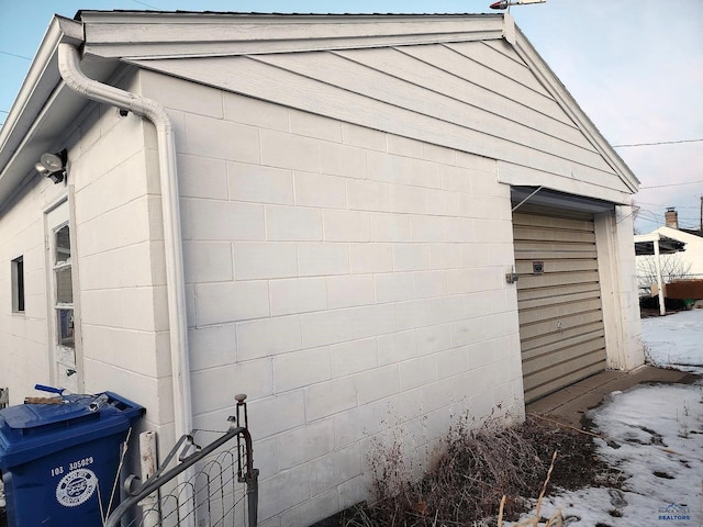 view of home's exterior featuring concrete block siding