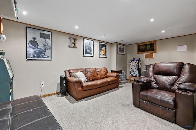 carpeted living room featuring baseboards and recessed lighting