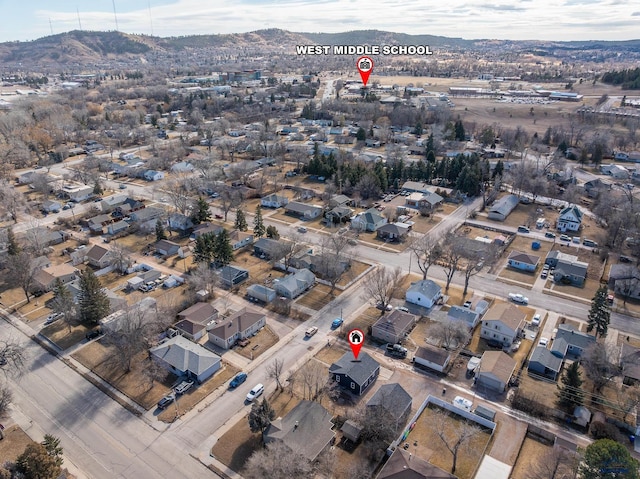 birds eye view of property featuring a residential view and a mountain view