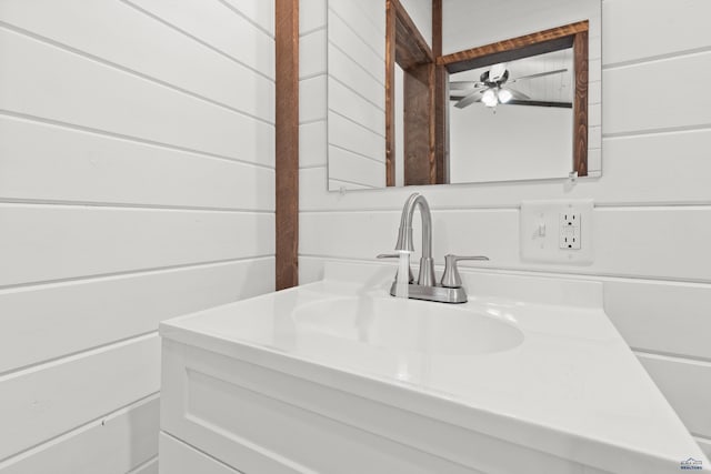 bathroom featuring a ceiling fan and vanity