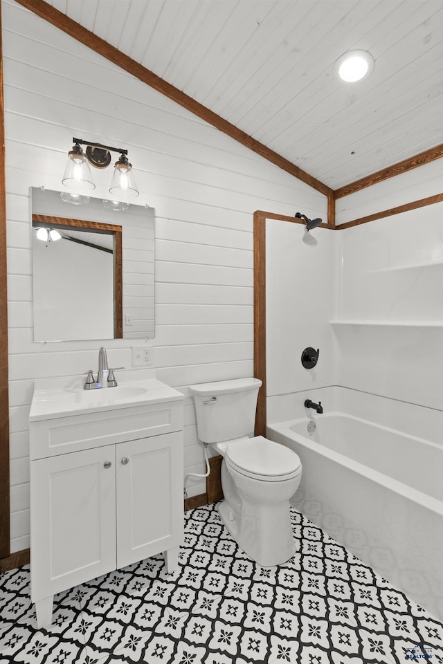 full bath featuring toilet, wood walls, shower / bath combination, vanity, and vaulted ceiling