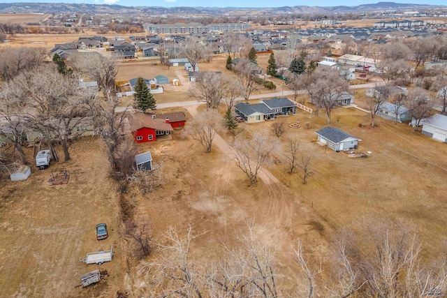 drone / aerial view with a mountain view and a residential view