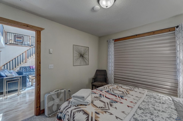 bedroom featuring a textured ceiling