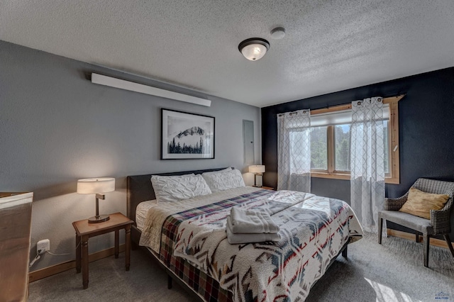 bedroom featuring a textured wall, carpet floors, a textured ceiling, and baseboards