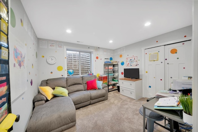 living room featuring recessed lighting and light colored carpet