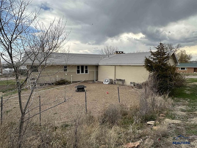 1001 E St, Edgemont, SD 57735 - back of property featuring a fire pit