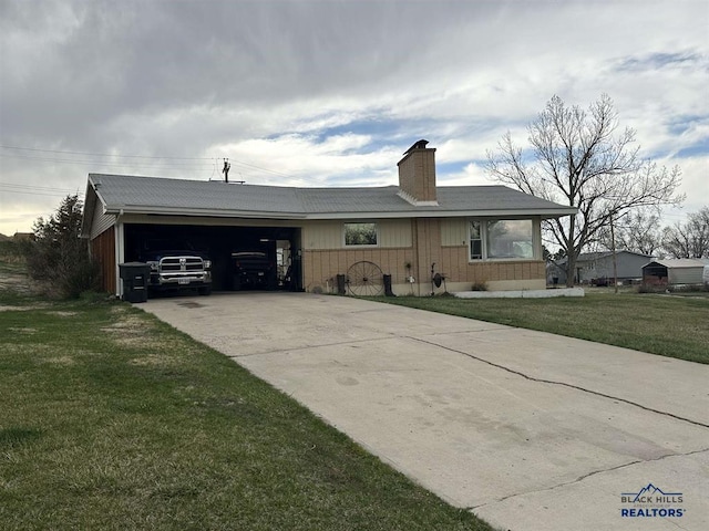 1001 E St, Edgemont, SD 57735 - ranch-style house with concrete driveway, a chimney, and a front yard