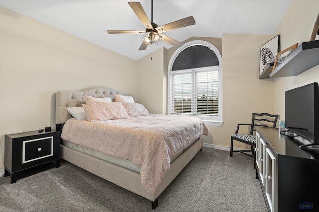 bedroom featuring vaulted ceiling, ceiling fan, carpet, and baseboards