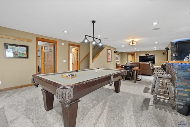 game room with baseboards, a bar, recessed lighting, and light colored carpet