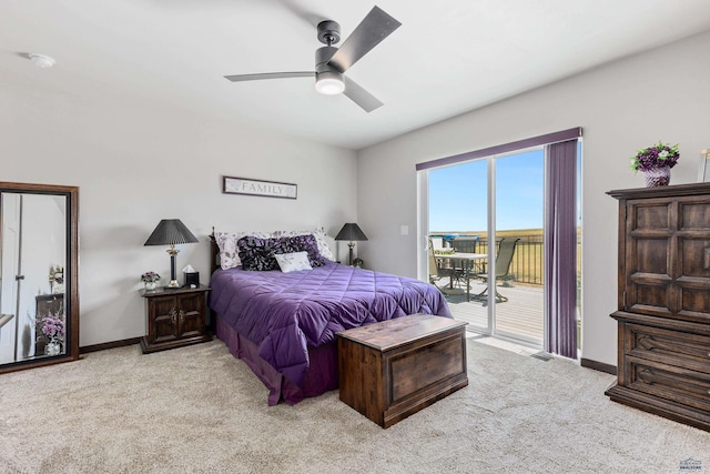 14113 Treasure Coach Rd, Piedmont, SD 57769 - bedroom with light colored carpet, baseboards, access to outside, visible vents, and a ceiling fan