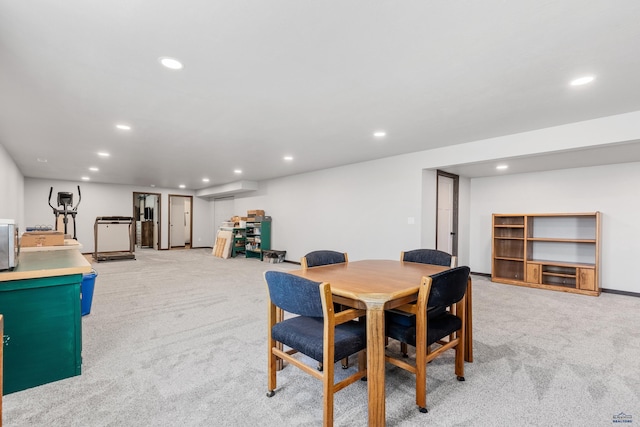 14113 Treasure Coach Rd, Piedmont, SD 57769 - dining area featuring a wall unit AC, recessed lighting, and light colored carpet