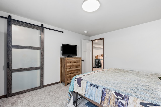 14113 Treasure Coach Rd, Piedmont, SD 57769 - carpeted bedroom featuring baseboards and a barn door