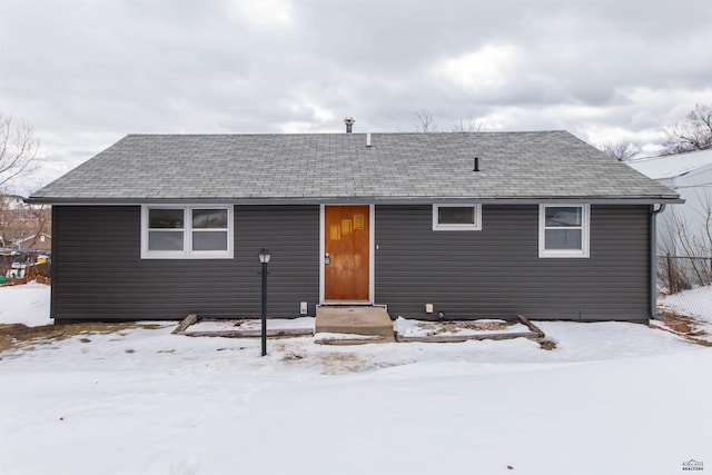 view of front of property with a shingled roof