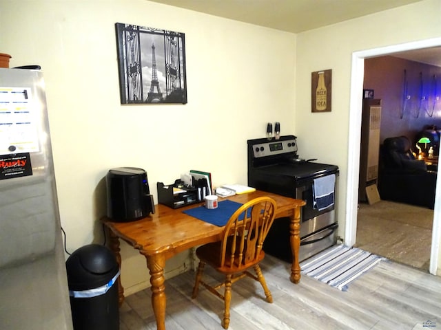 office area with wood finished floors