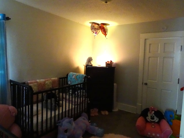 bedroom with a nursery area