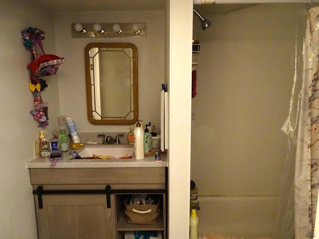 full bathroom with shower / bath combo and vanity