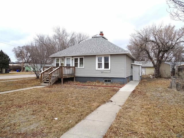 300 E Adams, Rapid City, SD 57701 - view of front of property with roof with shingles and a chimney