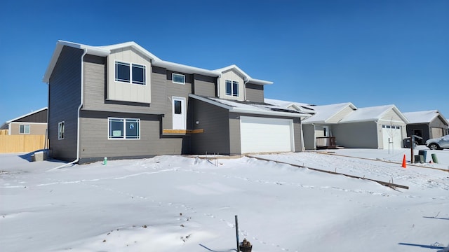 424 Yelner Dr Lot 38Blk 4, Box Elder, SD 57719 - view of front of house featuring an attached garage and board and batten siding